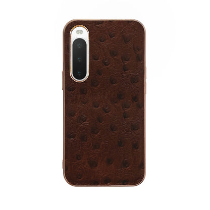 Coffee brown ostrich-textured leather phone case with raised lens frames