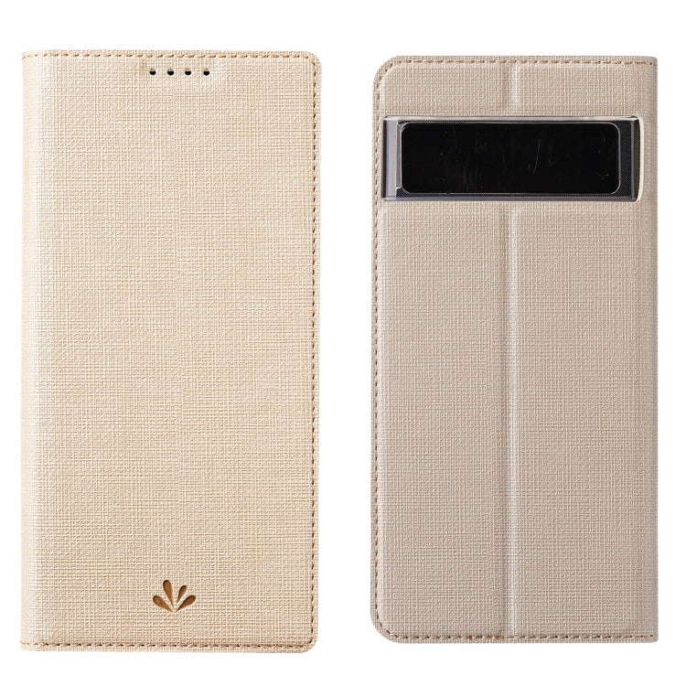 Gold-tone textured leather phone case with top cutout and fold-over front cover