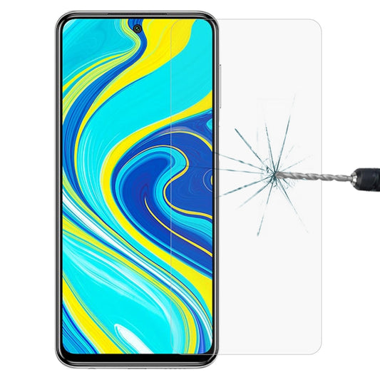 Tempered glass screen protector on smartphone, with impact crack shown through the glass