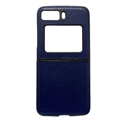 Blue genuine leather phone case with lychee texture, cutouts for camera and ports.