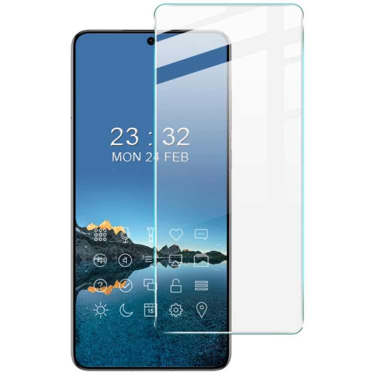 Tempered glass screen protector film on a smartphone, transparent with rounded edges