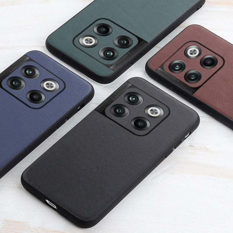 Lambskin-textured leather phone cases in brown, green, blue, and black with camera cutouts