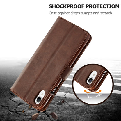Brown calf-textured leather folio phone case with stitched edges and camera openings