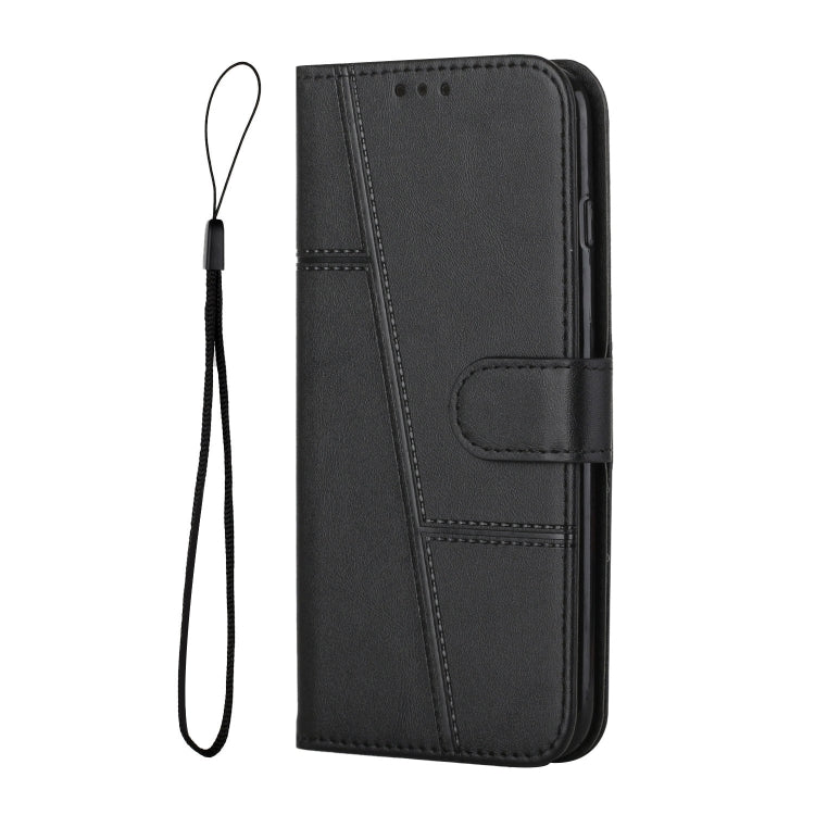 Black leather phone case with wrist strap, stitching details, and front camera cutout