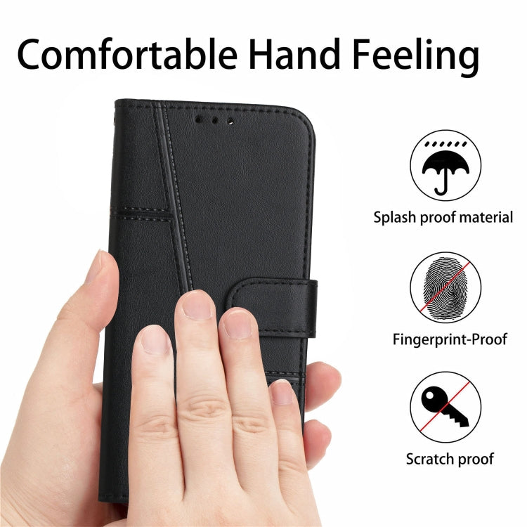 Black leather phone case with buckle closure, shown held by a hand