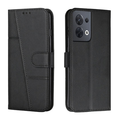 Black leather flip phone case with stitched design and side buckle, camera cutout