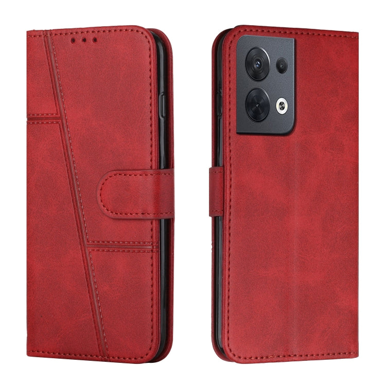 Red leather flip phone case with stitched design and side buckle, dual camera cutout
