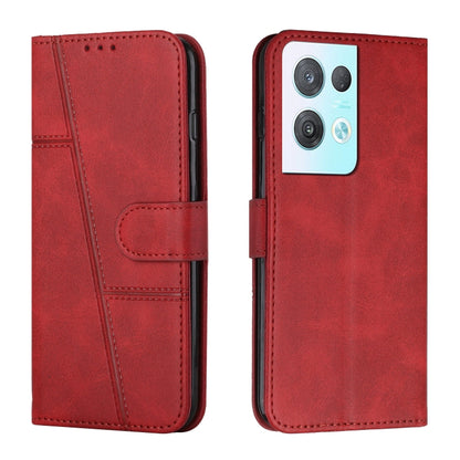 Red leather phone case with stitched texture and front buckle strap, phone camera cutouts