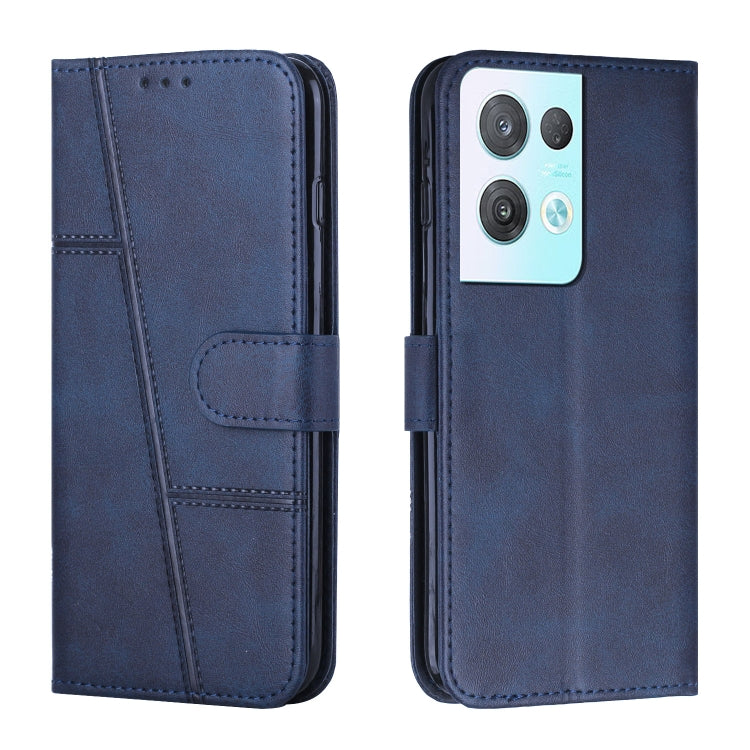 Navy leather phone case with stitched texture and front buckle strap, phone camera cutouts