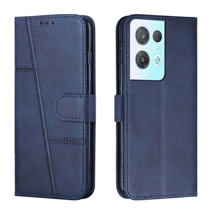 Navy leather phone case with stitched texture and front buckle strap, phone camera cutouts