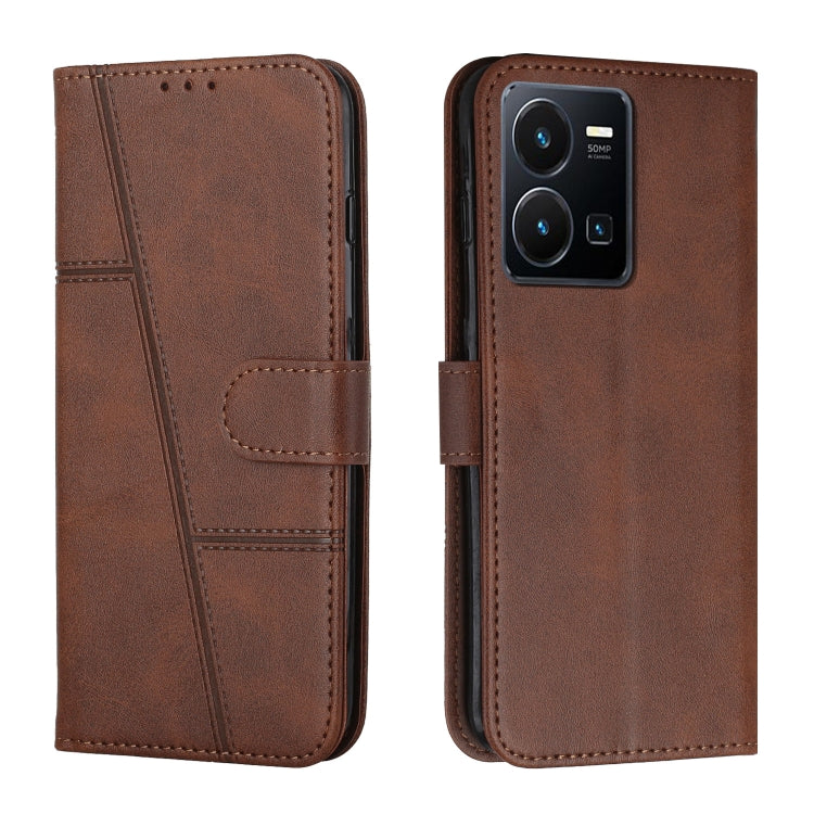 Brown leather phone case with flip cover and buckle strap, card slot and stitched panel