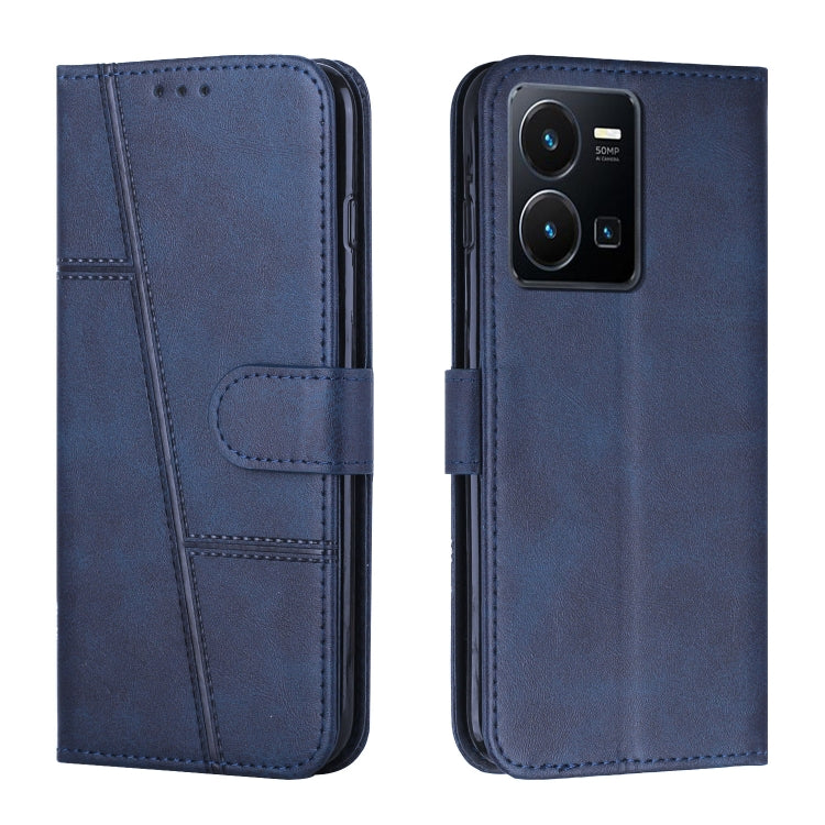 Blue leather flip phone case with buckle strap and card slot, stitched front panel