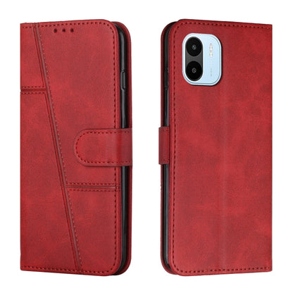 Red leather flip phone case with buckle strap and card slot, stitched trim detail
