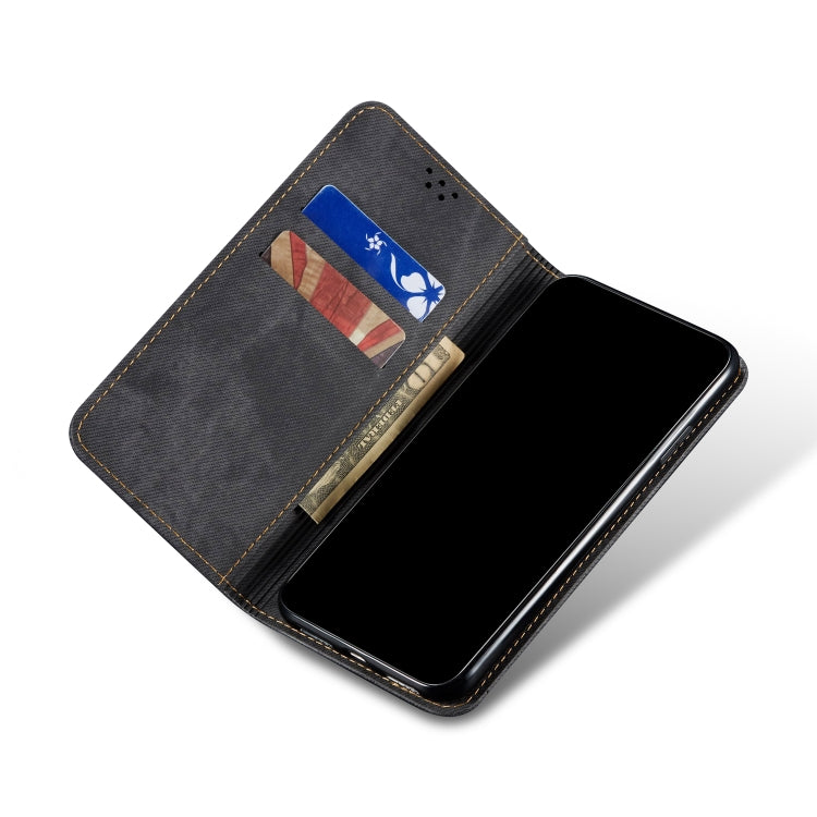 Flip phone wallet case open to show card slots and inner holder pocket, dark denim.
