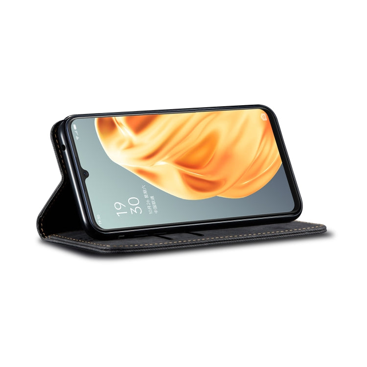 Flip leather phone wallet case with denim texture, shown with screen side and stand angle.