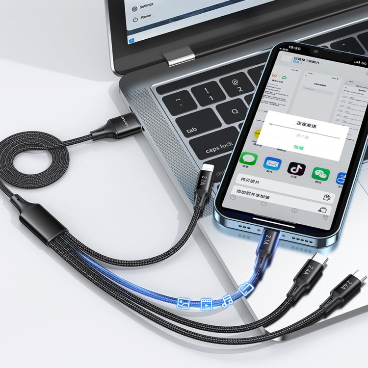 Braided black 4-in-1 charging cable with USB and phone connectors connected to devices