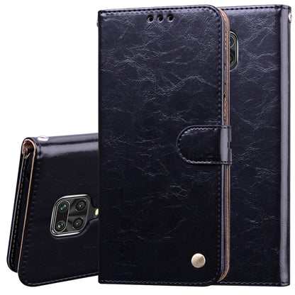 Black leather flip phone case with card slots and magnetic clasp, phone-side camera cutout.