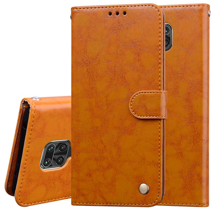 Orange leather-style flip phone wallet case with card pocket and magnetic snap
