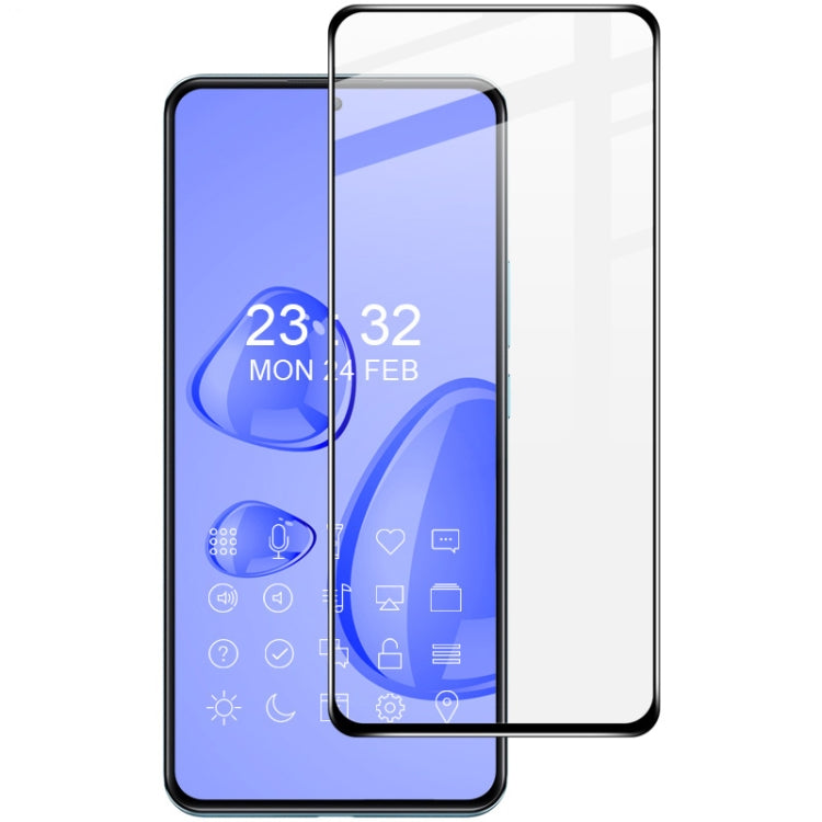 Clear full-screen tempered glass screen protector film aligned over smartphone