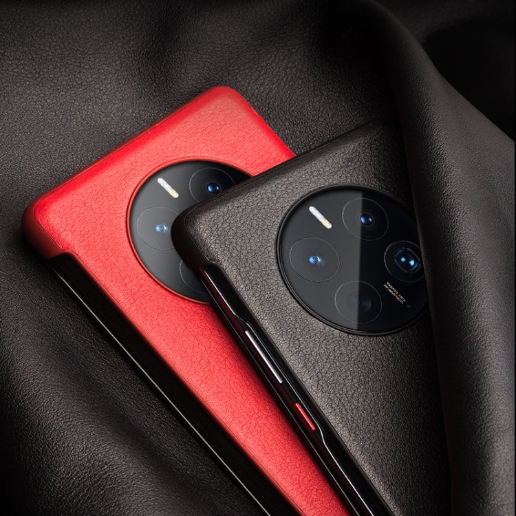 Red and black genuine leather smartphone cases with side window and camera cutouts.