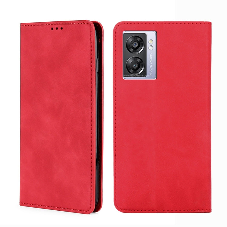 Red leather flip phone case with stitched edges and rear dual-camera cutout