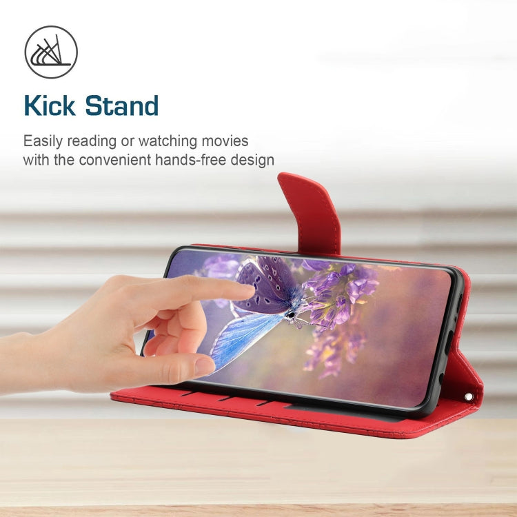 Red flip phone case in kickstand mode with embossed butterfly design.