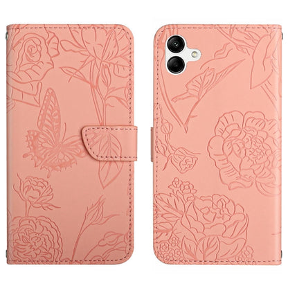 Pink butterfly-embossed flip leather phone case with folio cover and strap tab.