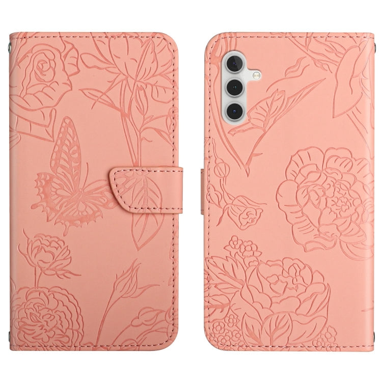 Blush pink butterfly-embossed flip leather phone case with magnetic strap and slot.