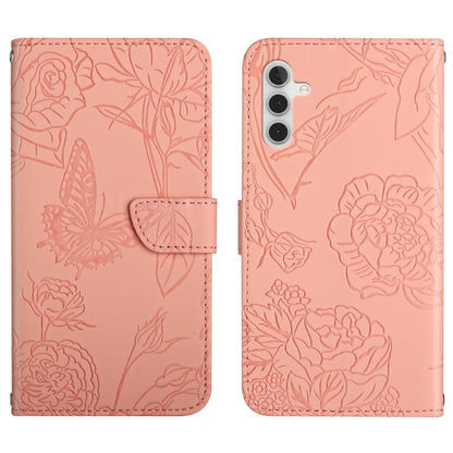 Blush pink butterfly-embossed flip leather phone case with magnetic strap and slot.