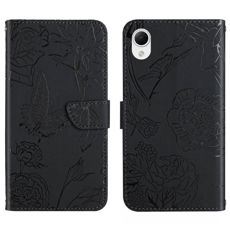 Black butterfly-embossed flip phone case with floral pattern and card slot