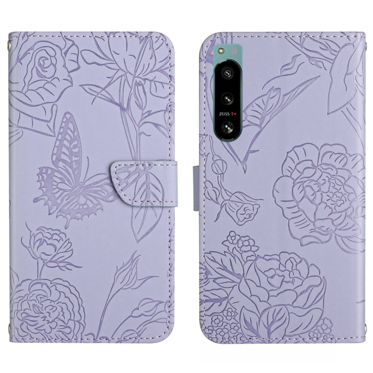 Light purple butterfly-embossed flip phone case with camera cutout and card slot