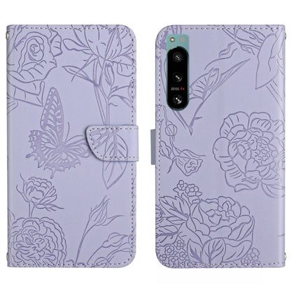 Light purple butterfly-embossed flip phone case with camera cutout and card slot