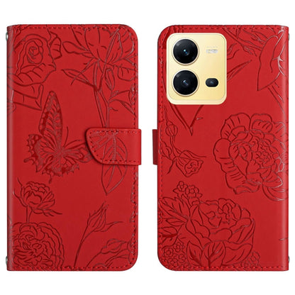 Red butterfly embossed flip leather phone case with front flap and camera openings.