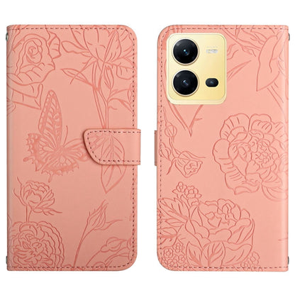 Pink butterfly embossed flip leather phone case with front flap and camera openings.