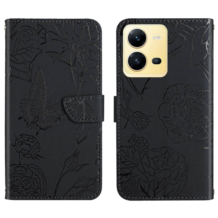 Black butterfly embossed flip leather phone case with front flap and camera openings.