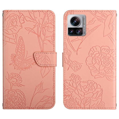 Pink butterfly-embossed flip leather phone case with front flap and camera cutout