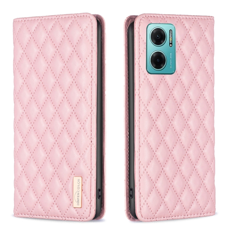 Pink diamond-lattice leather flip phone case with magnetic closure; front closed, camera side visible.