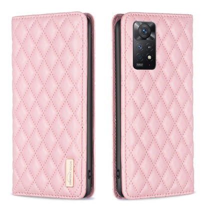 Pink leather flip phone case with diamond lattice texture and camera cutout