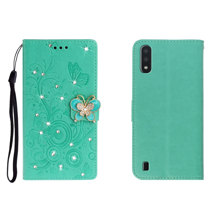 Green leather phone wallet case with embossed butterfly and rhinestone flower charm