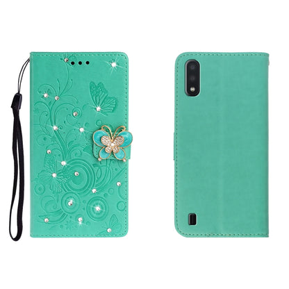 Green leather phone wallet case with embossed butterfly and rhinestone flower charm