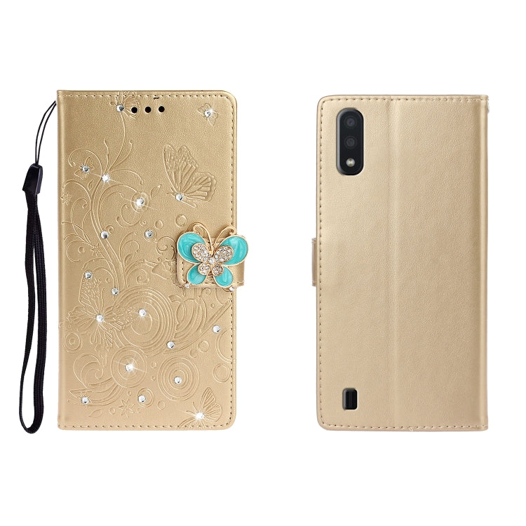 Gold-tone leather phone wallet case with embossed butterfly and rhinestone flower charm