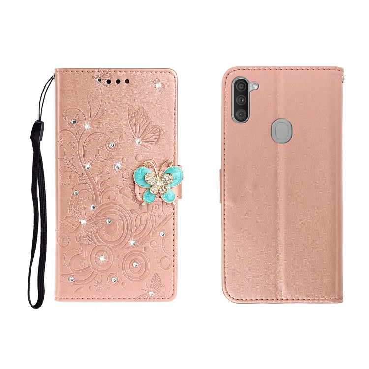 Rose pink butterfly rhinestone embossed phone wallet case with card slot and strap.