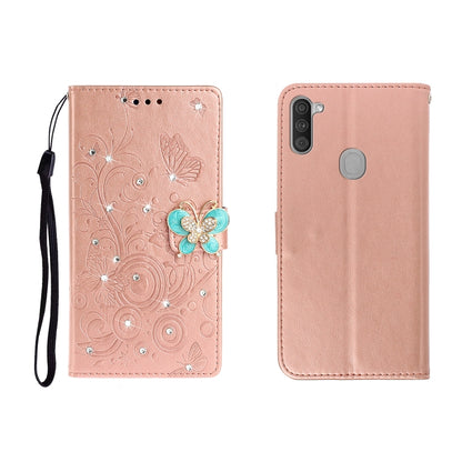 Rose pink butterfly rhinestone embossed phone wallet case with card slot and strap.