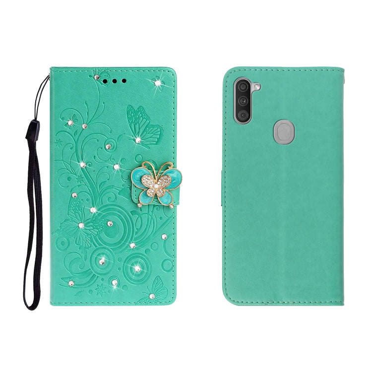 Green butterfly rhinestone embossed phone wallet case with card slot and strap.