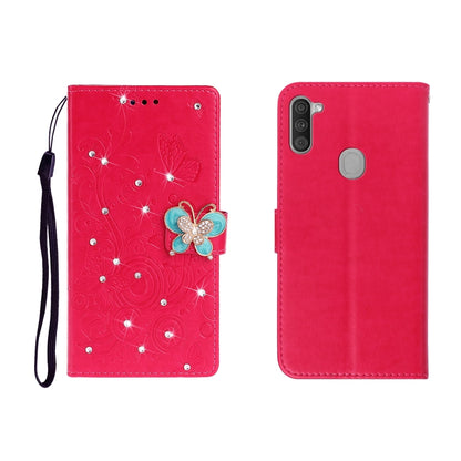 Red butterfly rhinestone embossed phone wallet case with card slot and strap.