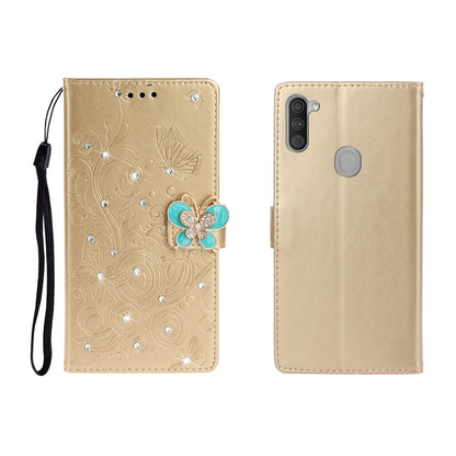 Gold butterfly rhinestone embossed phone wallet case with card slot and strap.