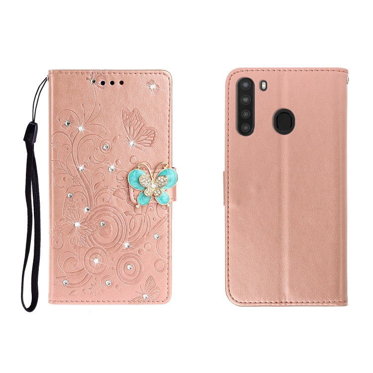 Rose pink butterfly rhinestone embossed phone wallet case with card slot and strap.