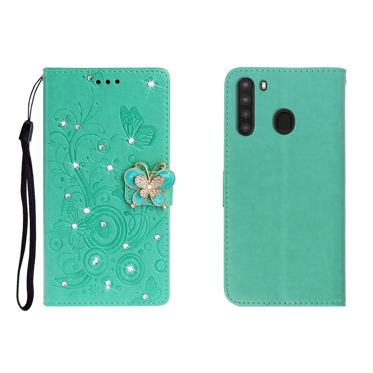 Green butterfly rhinestone embossed phone wallet case with card slot and strap.