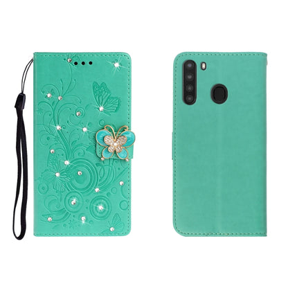 Green butterfly rhinestone embossed phone wallet case with card slot and strap.