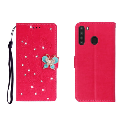Red butterfly rhinestone embossed phone wallet case with card slot and strap.